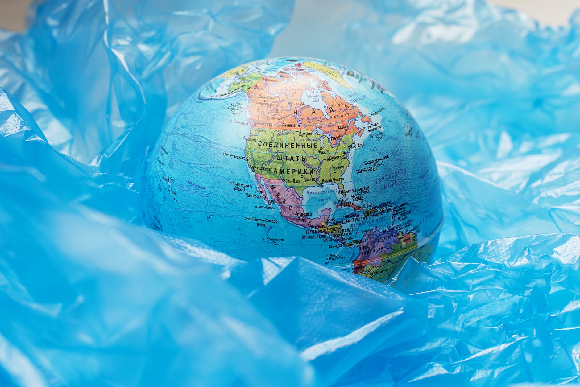 blue plastic around a globe